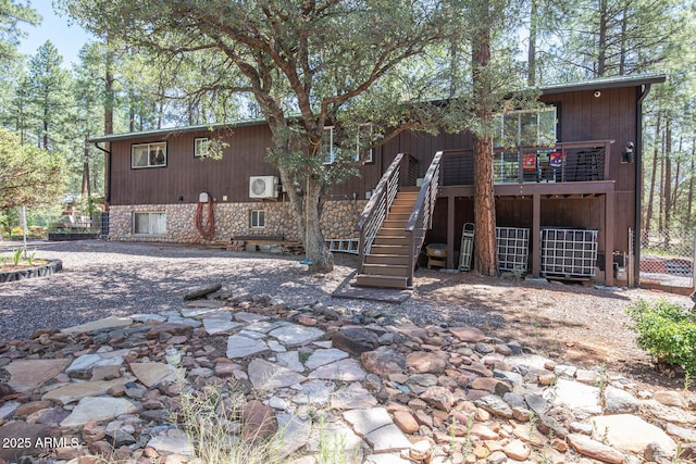 8894 W Lufkin Dr, Pine, AZ 85544 - rear view of property featuring stairway and a deck