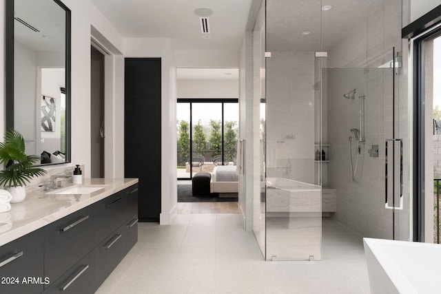 bathroom featuring vanity, plus walk in shower, and tile patterned floors