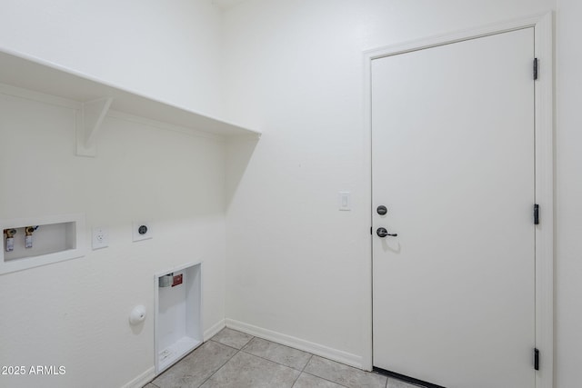 laundry area with washer hookup, light tile patterned floors, hookup for an electric dryer, gas dryer hookup, and laundry area