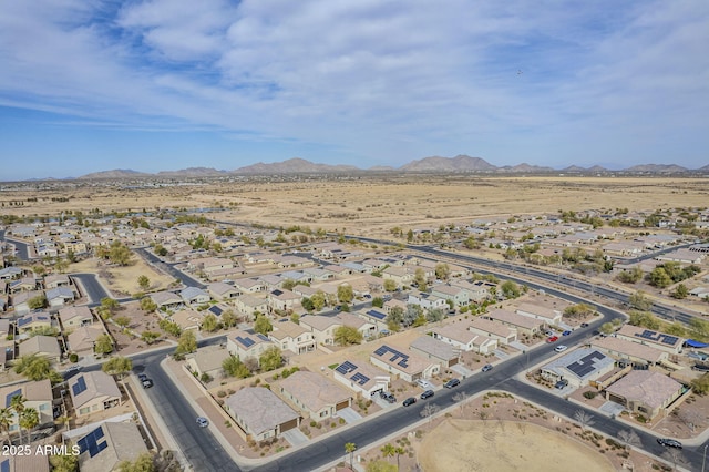 drone / aerial view with a residential view and a mountain view