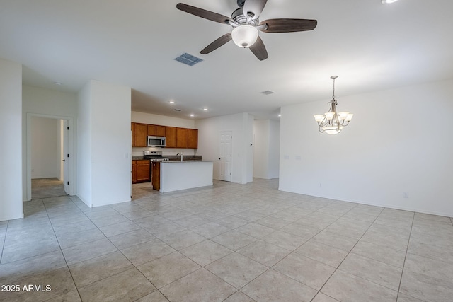 unfurnished living room featuring light tile patterned floors, recessed lighting, visible vents, and ceiling fan with notable chandelier