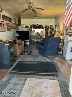 living room with ceiling fan