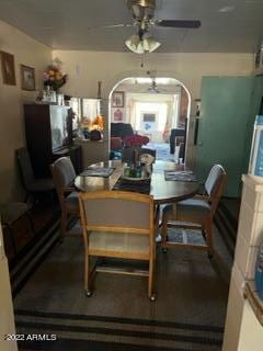 dining space featuring ceiling fan