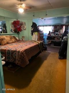 bedroom featuring ceiling fan and carpet flooring