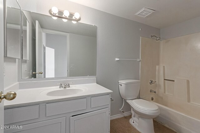 full bathroom featuring toilet, shower / bath combination, tile patterned floors, and vanity