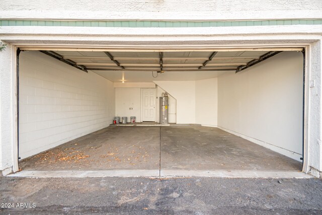 garage featuring electric water heater