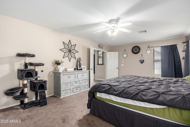 carpeted bedroom featuring baseboards, visible vents, and a ceiling fan