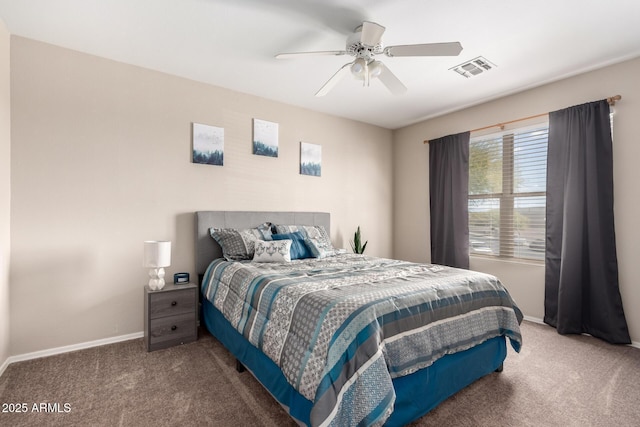 bedroom with baseboards, visible vents, carpet floors, and a ceiling fan