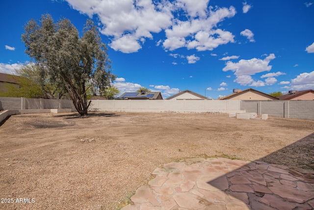 view of yard featuring a fenced backyard and a patio