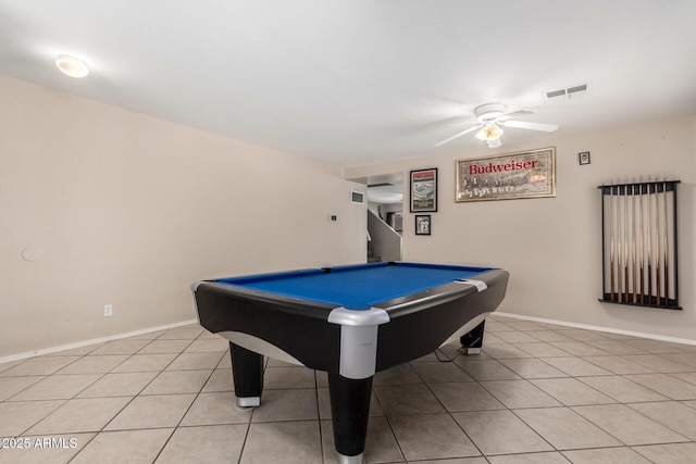playroom featuring baseboards, ceiling fan, visible vents, and light tile patterned floors