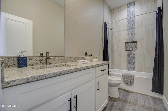 full bathroom featuring vanity, hardwood / wood-style floors, shower / bath combination with curtain, and toilet