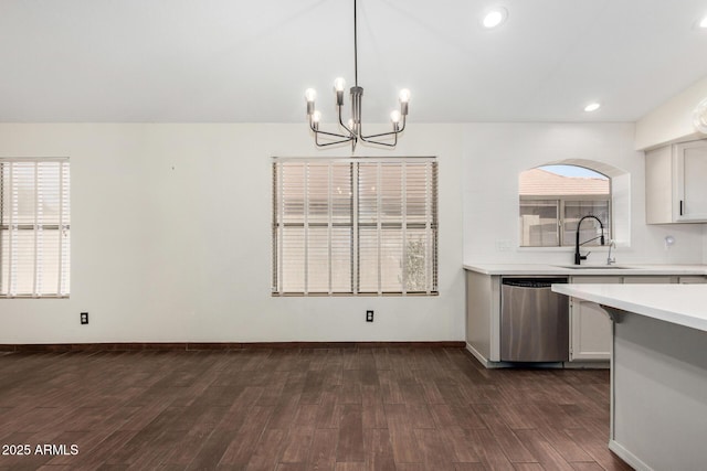 6502 W Wahalla Ln, Glendale, AZ 85308 - kitchen featuring stainless steel dishwasher, light countertops, a chandelier, dark wood-style flooring, and pendant lighting