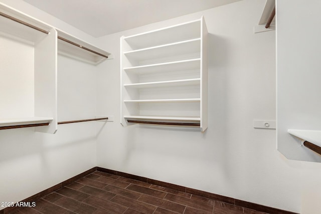6502 W Wahalla Ln, Glendale, AZ 85308 - walk in closet with dark wood-style floors