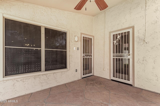 6502 W Wahalla Ln, Glendale, AZ 85308 - doorway to property featuring a ceiling fan, stucco siding, and a patio area