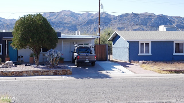 ranch-style house with a mountain view