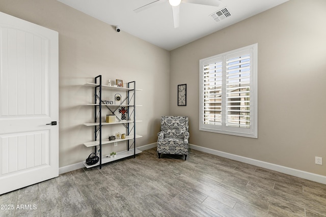 unfurnished room featuring ceiling fan and wood-type flooring