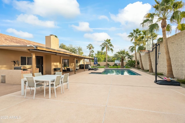 view of pool featuring a patio area