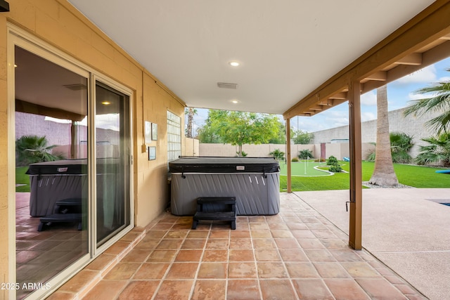 view of patio featuring a hot tub