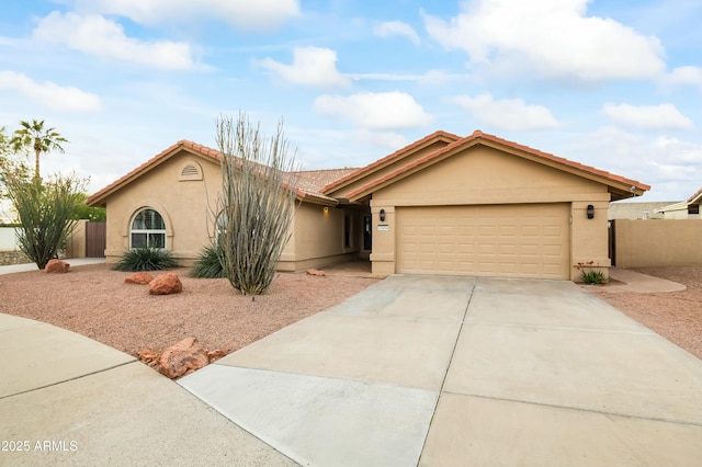 ranch-style house featuring a garage