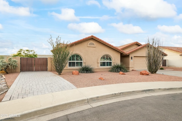 view of front of house featuring central AC and a garage