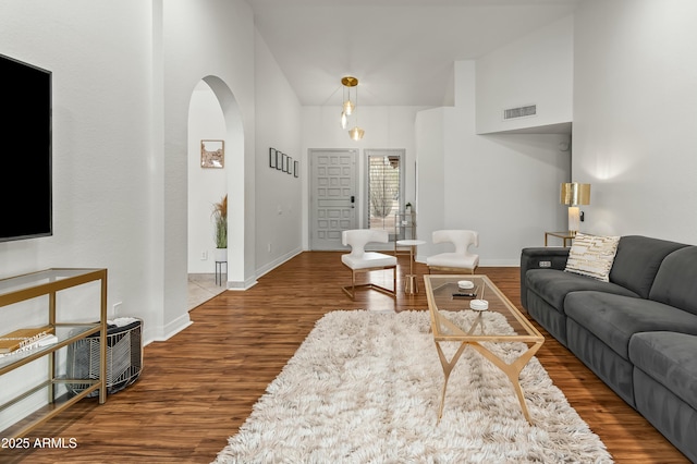 living room featuring dark hardwood / wood-style floors