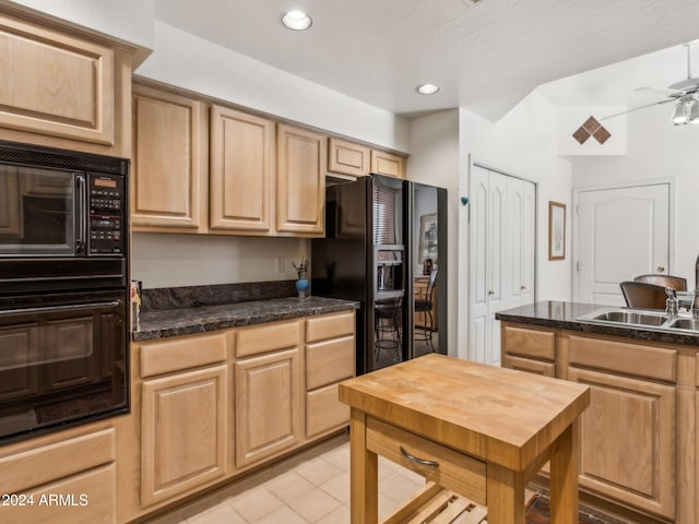 kitchen featuring black appliances, sink, ceiling fan, light brown cabinetry, and light tile patterned flooring