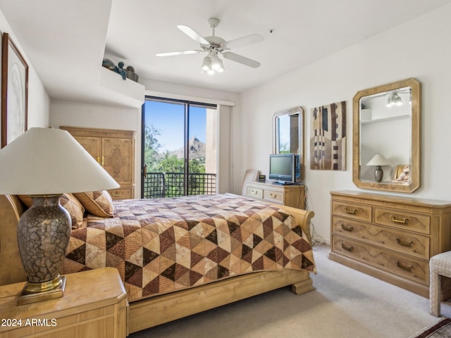 bedroom featuring carpet flooring, ceiling fan, and access to exterior