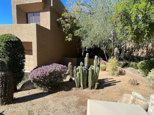 view of yard featuring a garage