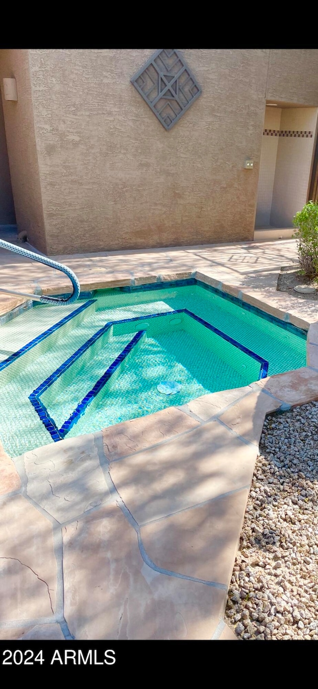 view of pool with a patio area