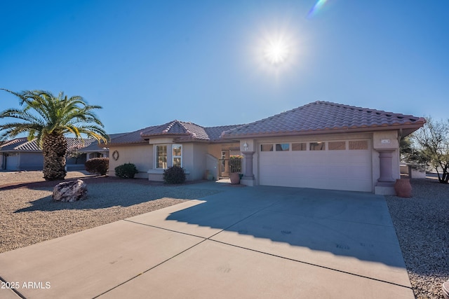 view of front of home with a garage