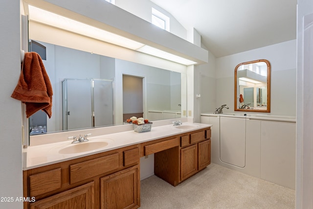 bathroom with lofted ceiling, an enclosed shower, and vanity