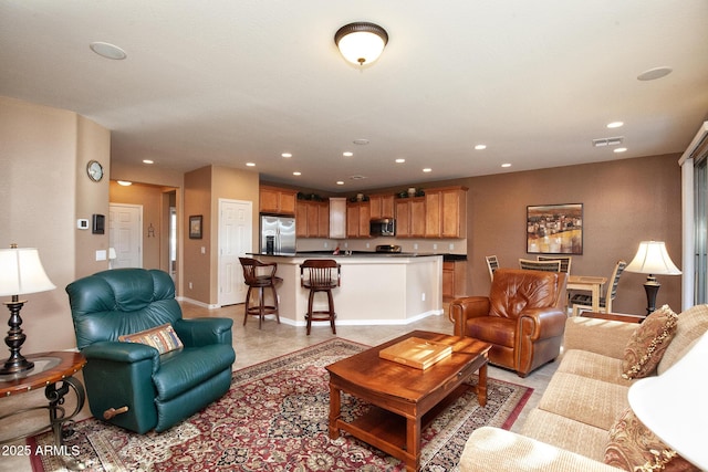 living room featuring light tile patterned floors