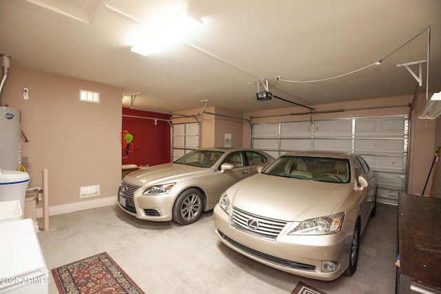 garage with a garage door opener and water heater