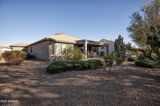 view of front of house with a patio