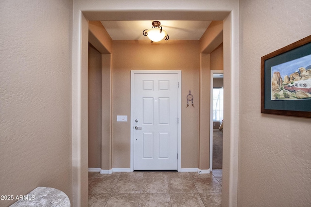 view of tiled foyer