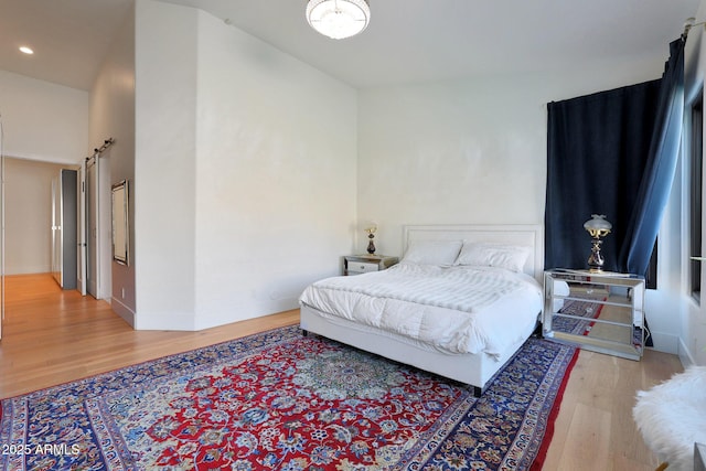 bedroom featuring light hardwood / wood-style floors