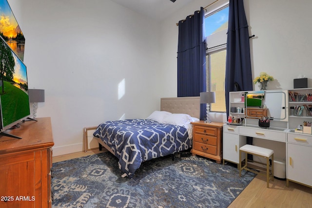 bedroom featuring hardwood / wood-style flooring