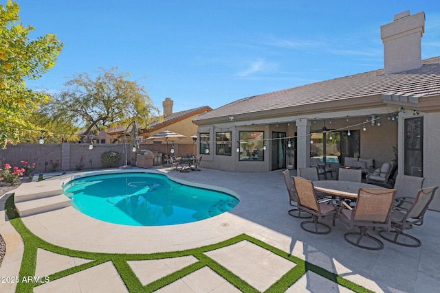 view of pool with a patio area