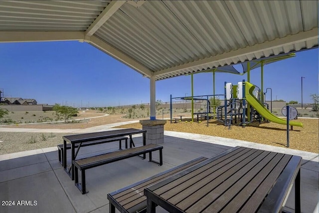 view of patio featuring a playground