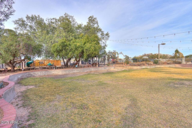 view of yard featuring playground community