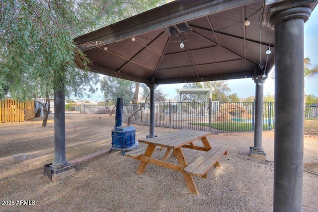 view of community featuring a gazebo and fence