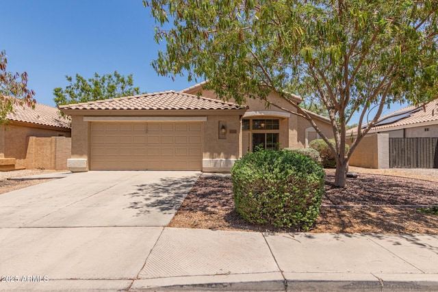 10318 E Plata Ave, Mesa, AZ 85212 - mediterranean / spanish home with stucco siding, a garage, driveway, and a tile roof