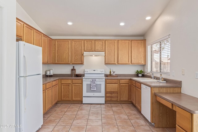 10318 E Plata Ave, Mesa, AZ 85212 - kitchen with white appliances, under cabinet range hood, recessed lighting, lofted ceiling, and light tile patterned flooring