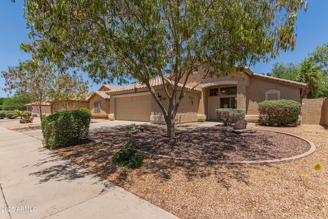10318 E Plata Ave, Mesa, AZ 85212 - view of front of property with stucco siding, a garage, a tile roof, and concrete driveway