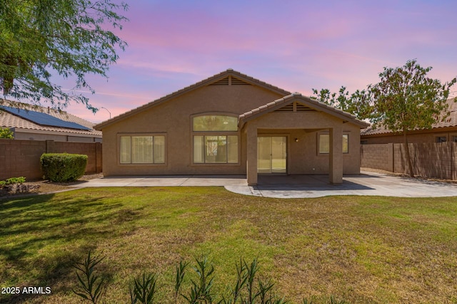 10318 E Plata Ave, Mesa, AZ 85212 - back of property with a patio area, stucco siding, a fenced backyard, and a tile roof
