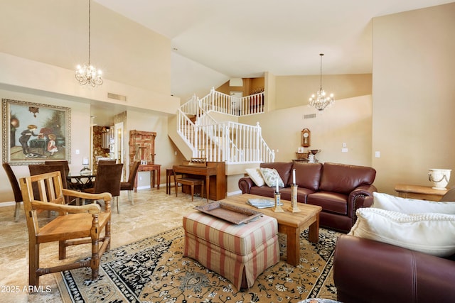 3538 E Squawbush Pl, Phoenix, AZ 85044 - living room with a chandelier, stairs, high vaulted ceiling, and baseboards