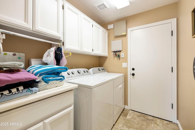 3538 E Squawbush Pl, Phoenix, AZ 85044 - clothes washing area featuring washing machine and dryer, cabinet space, and baseboards