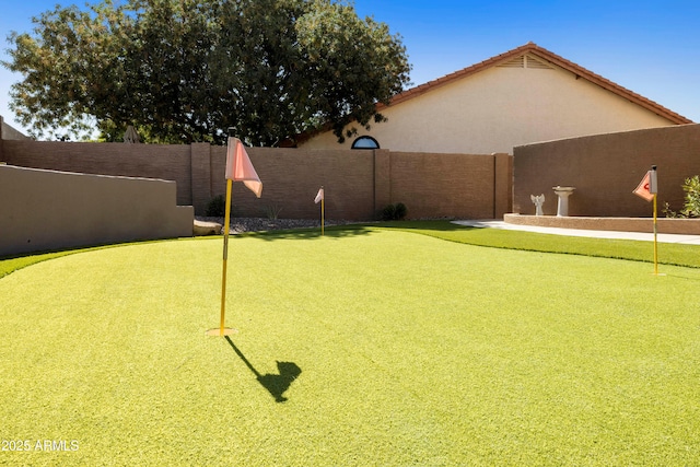 3538 E Squawbush Pl, Phoenix, AZ 85044 - fenced backyard with an area to practice putting