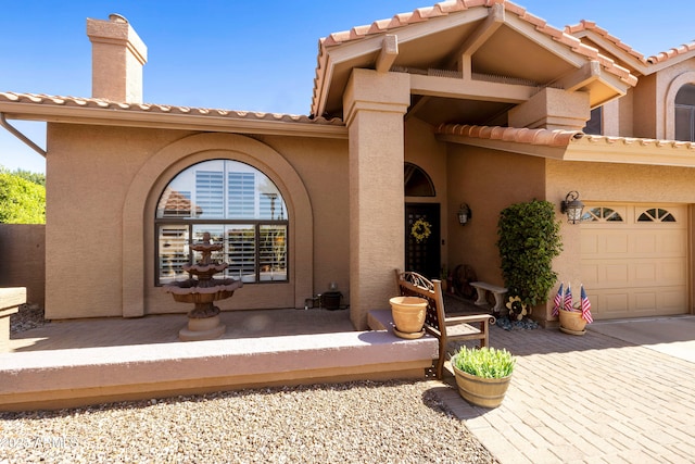 3538 E Squawbush Pl, Phoenix, AZ 85044 - entrance to property featuring stucco siding and a tiled roof