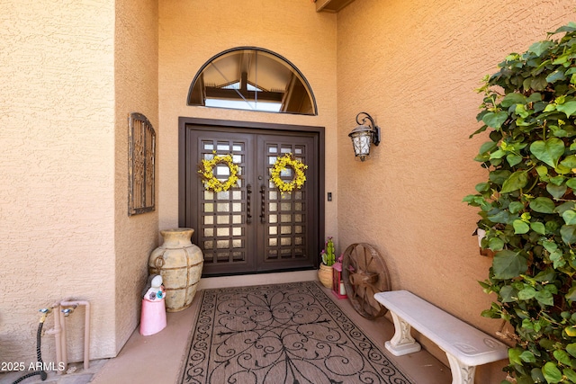 3538 E Squawbush Pl, Phoenix, AZ 85044 - doorway to property featuring stucco siding
